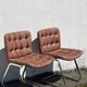 Paire de chaises en cuir par Robert Haussman