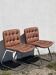 Pair of leather chairs by Robert Haussman