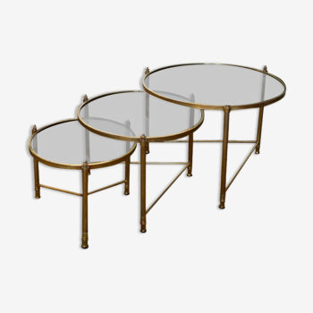 Brass nesting tables and smoked glass