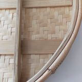 Round serving tray made of vintage bamboo and wicker