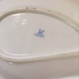 Dish with porcelain compartments.