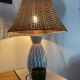 Blue ceramic lamp and rattan