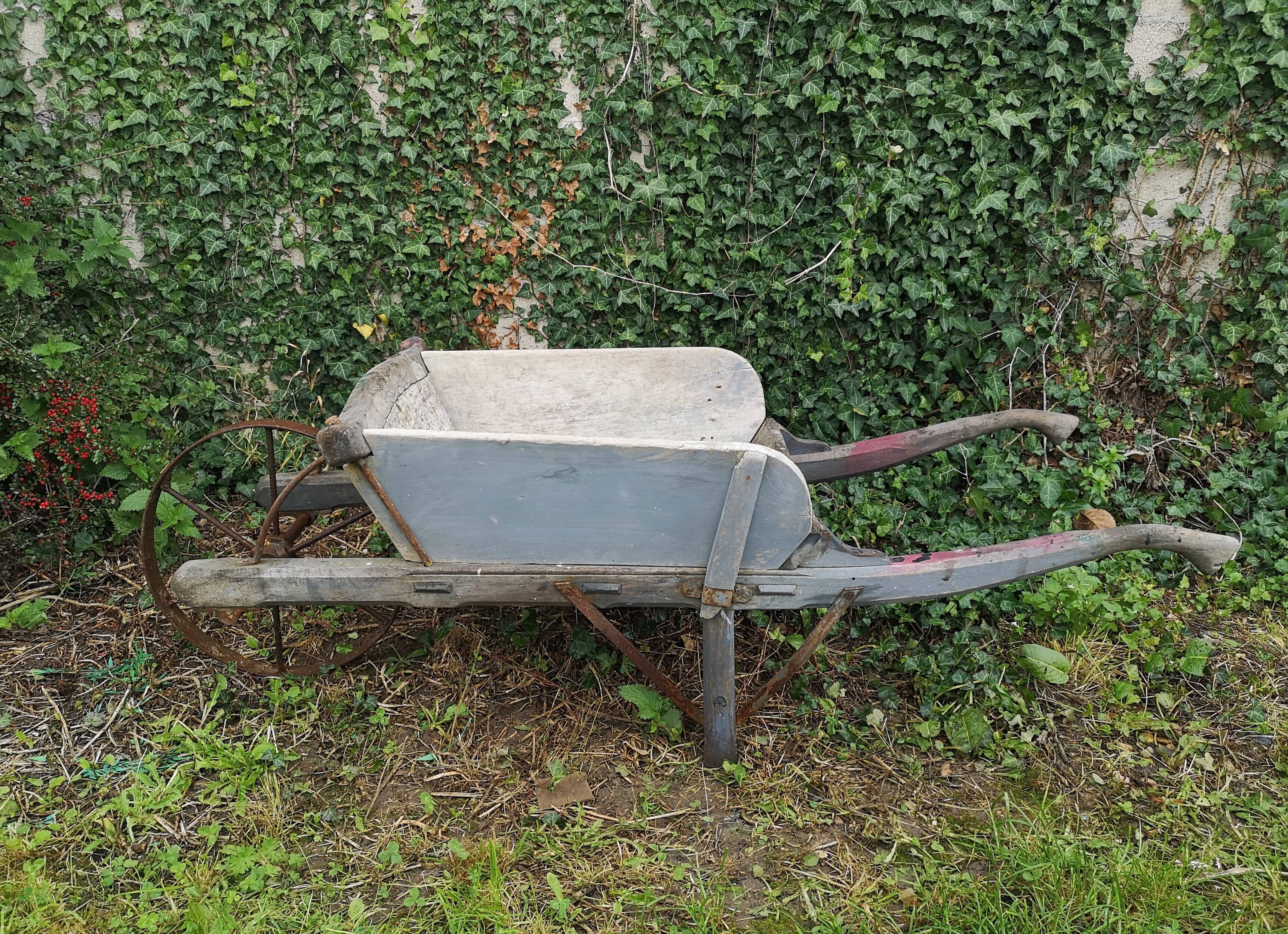 Wheelbarrow old folk art