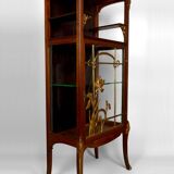 Art Nouveau display case, bronzes and carved wood on a floral theme, circa 1900