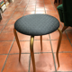Tabouret capitonné