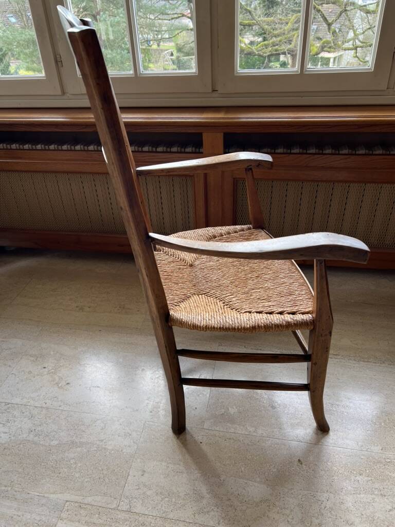 Fauteuil rustique en bois et paille