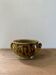 Vintage ceramic flowerpot with braided ears