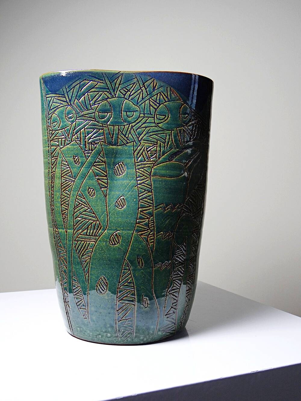 Vintage blue-green artisan pottery vase with incised tribal decoration Eseka Pottery.