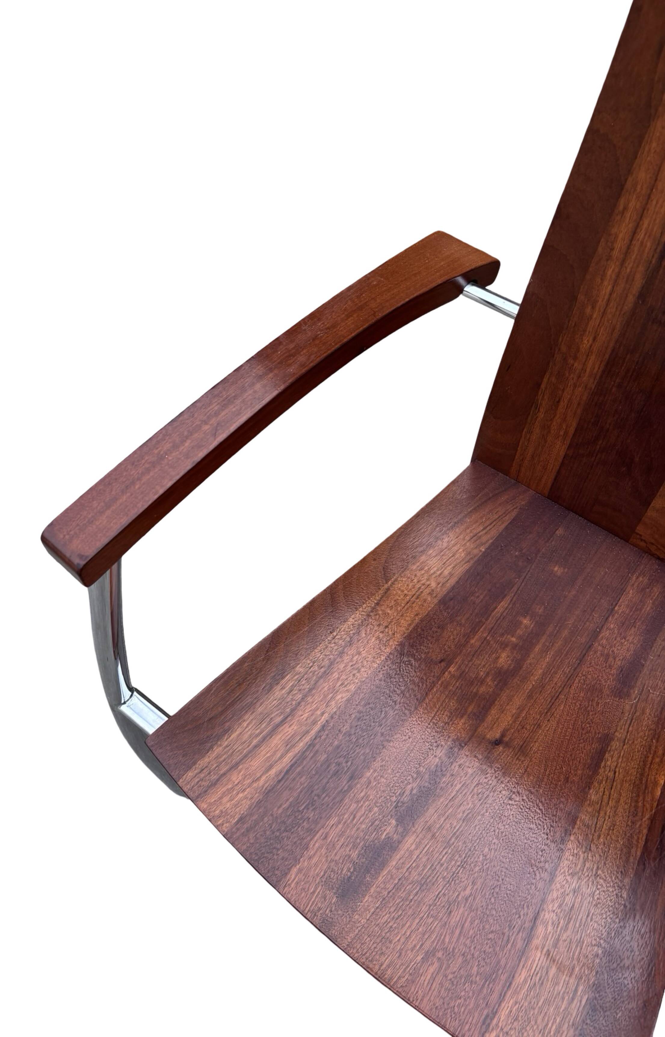 Ensemble vintage de quatre chaises design en hêtre massif chrome