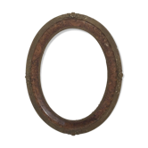 Oval frame in wood and gilded stucco