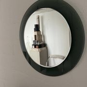 Decorative round wall mirror in smoked glass, Space Age Italian collectible