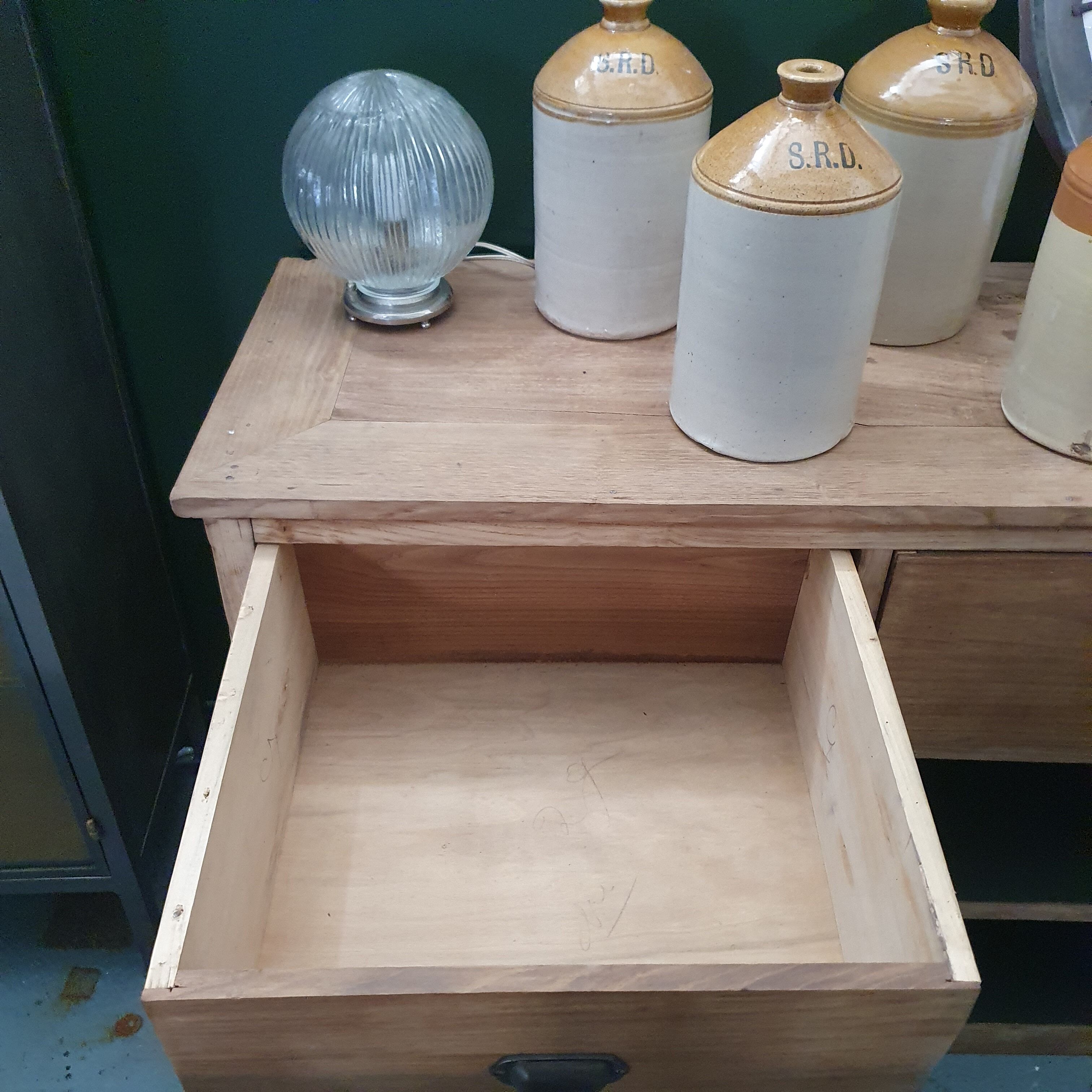 Old piece of trade furniture with chestnut drawer