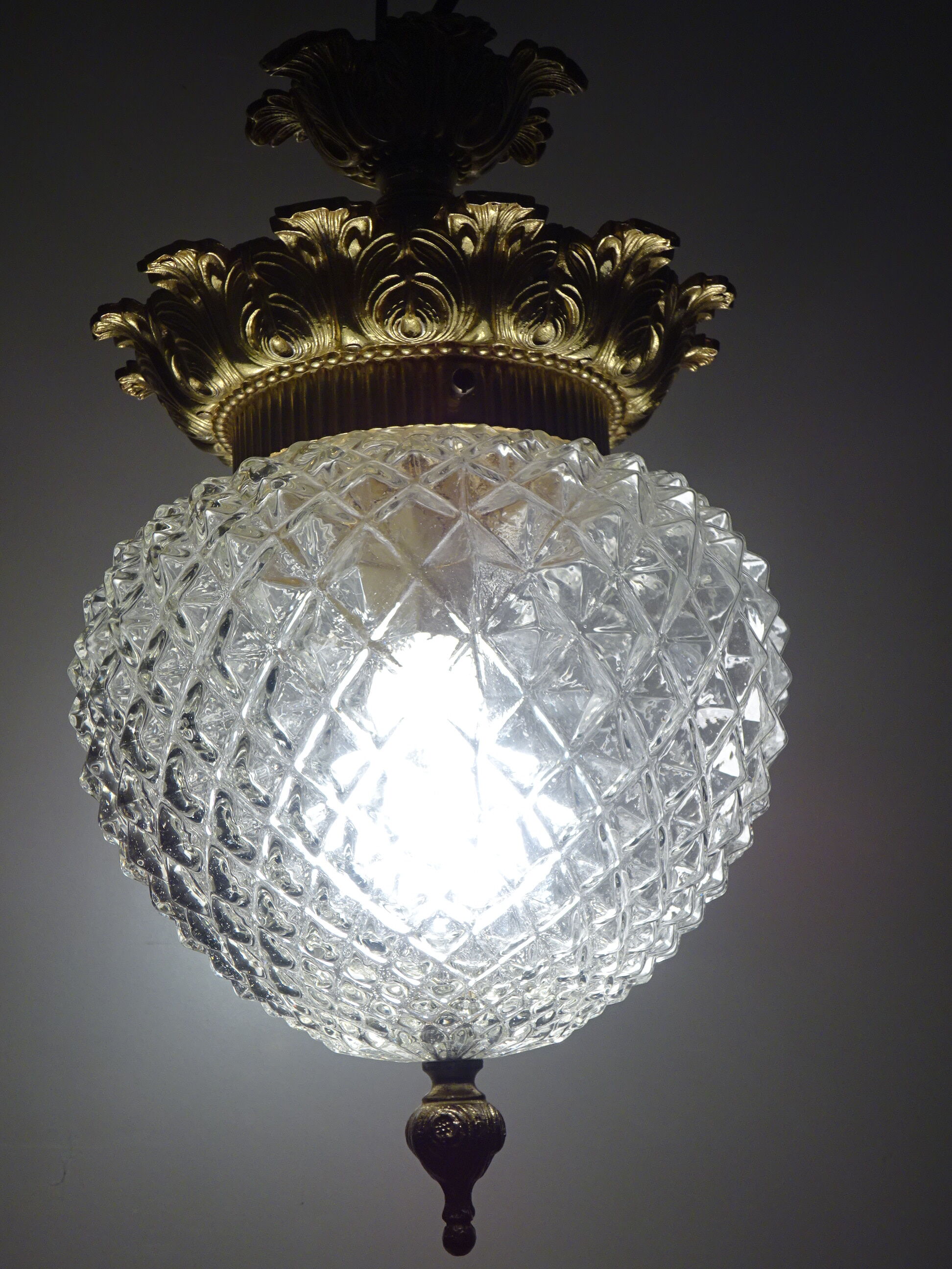 Glass and brass globe chandelier