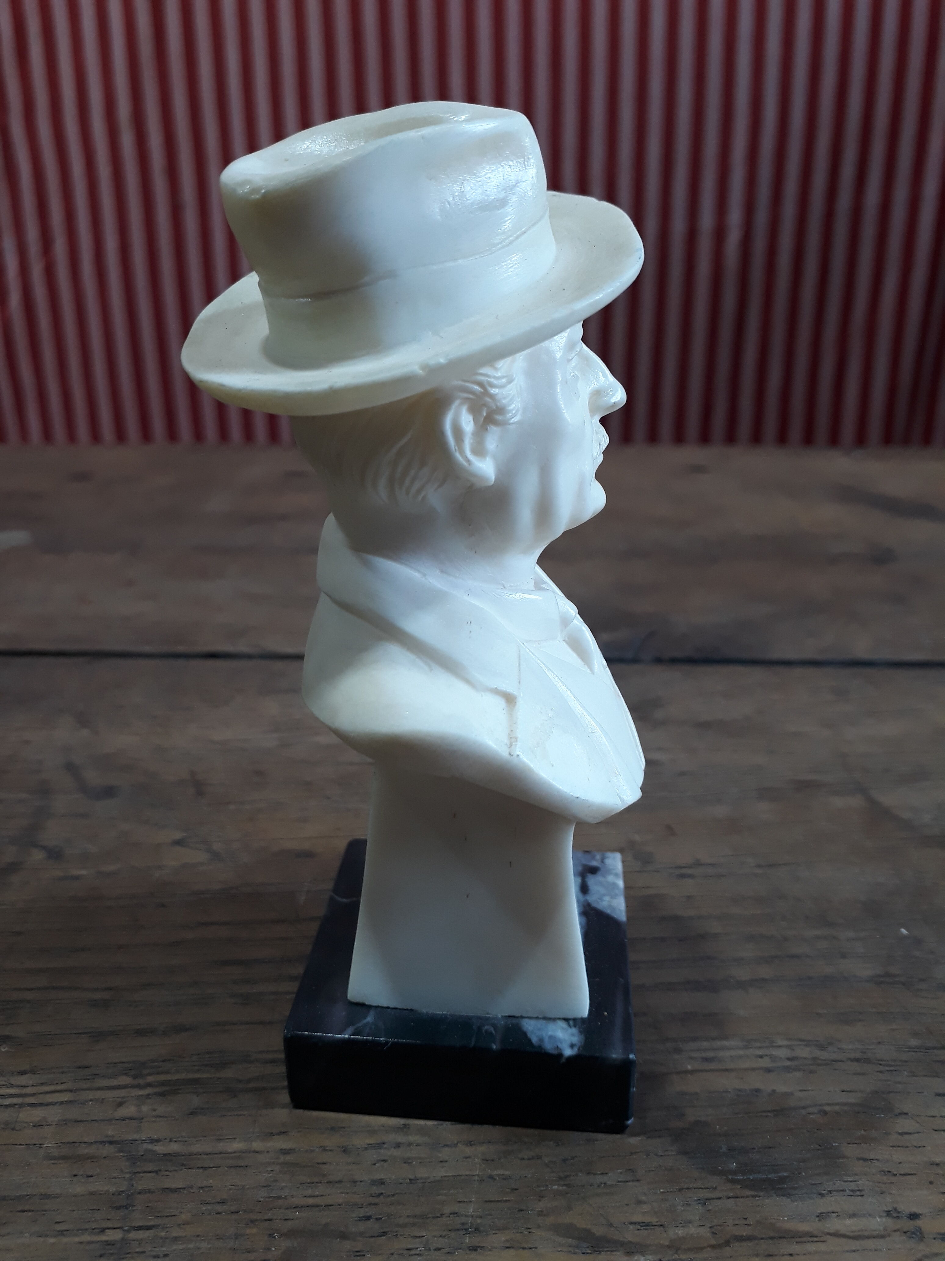 Resin bust by Puccini, marble base