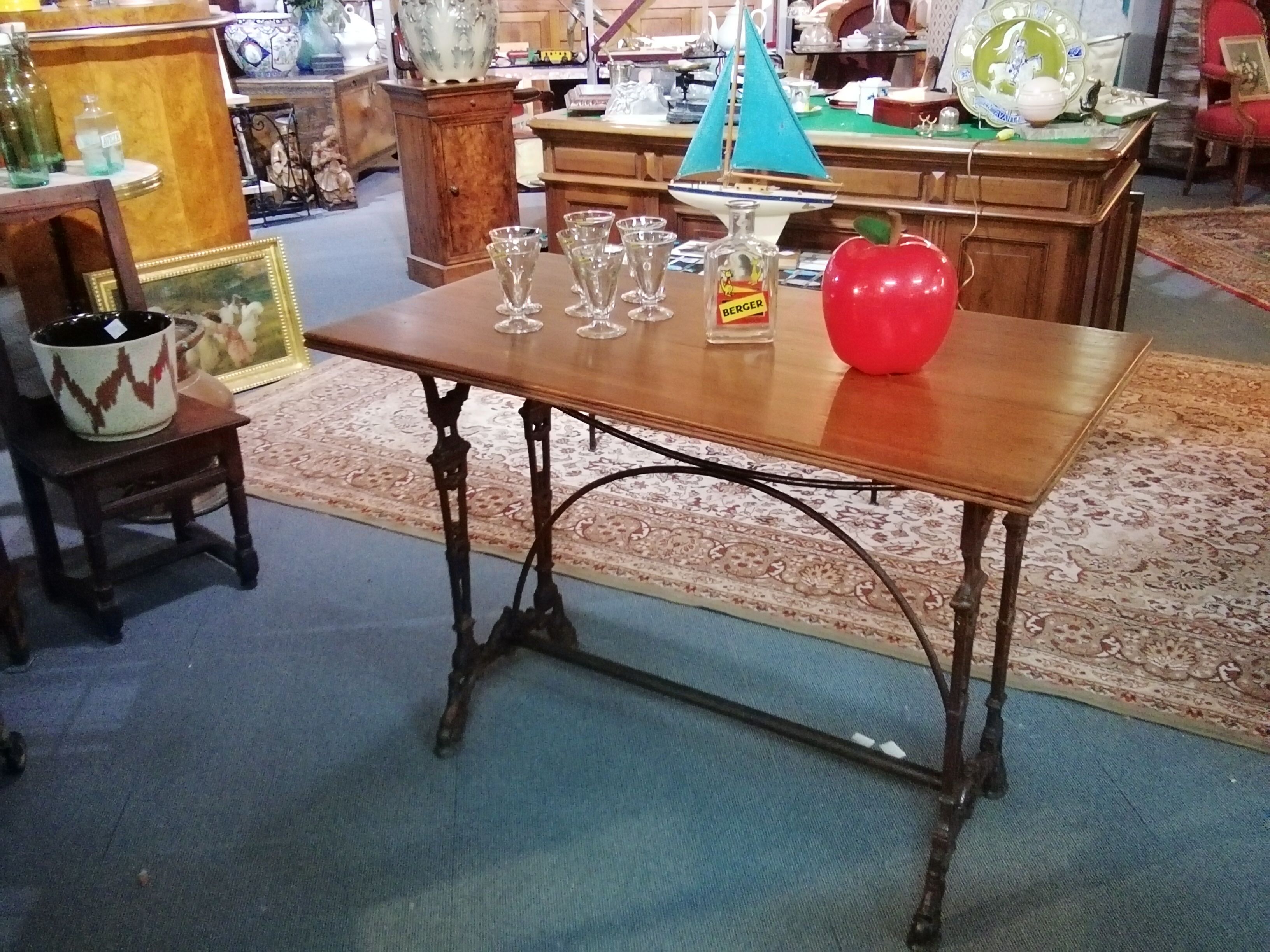 Bistro table over wood cast iron legs