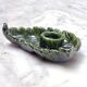 Small candle holder in green slip ceramic