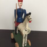 Soldier on wooden horse to shoot
