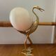 Oiseau en laiton et œuf d’autruche