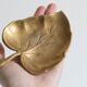 Empty old brass leaf bags