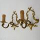 Vintage pair of bronze wall sconces from the 1950s and 60s.