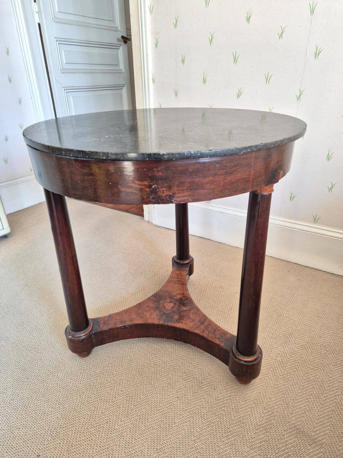 Mahogany side table with a marble top