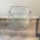 Chrome and glass side table. 1970. Space age.