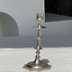 A large silver candlestick holder H23