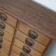 Antique French oak filing / apothecary cabinet by Chouanard, ca 1910
