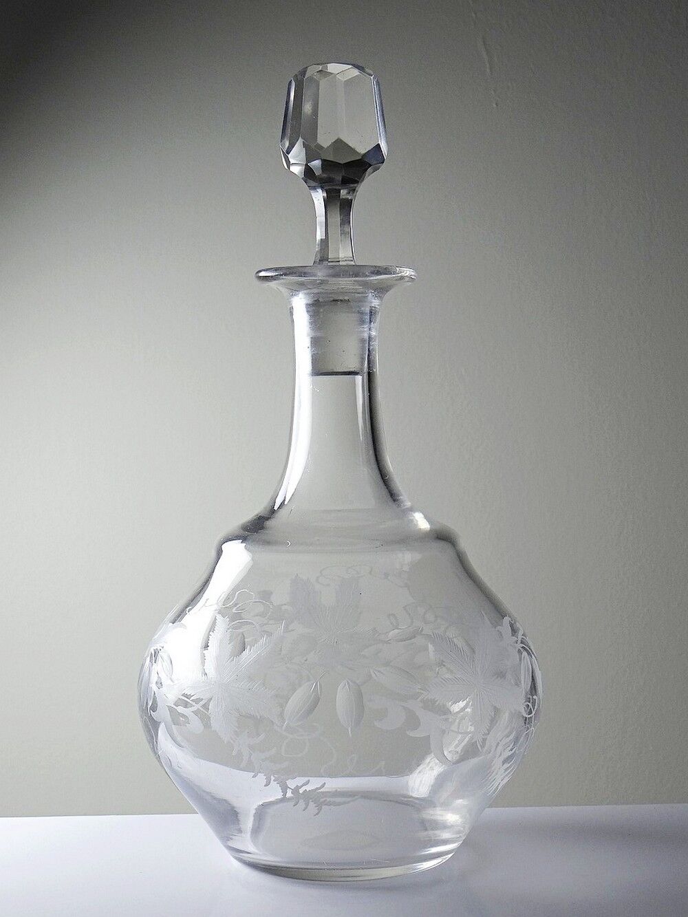 Antique engraved crystal carafe, floral decoration, Bohemia 19th-20th century.