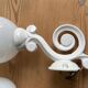 Antique enamelled cast iron wall lights / opaline globe