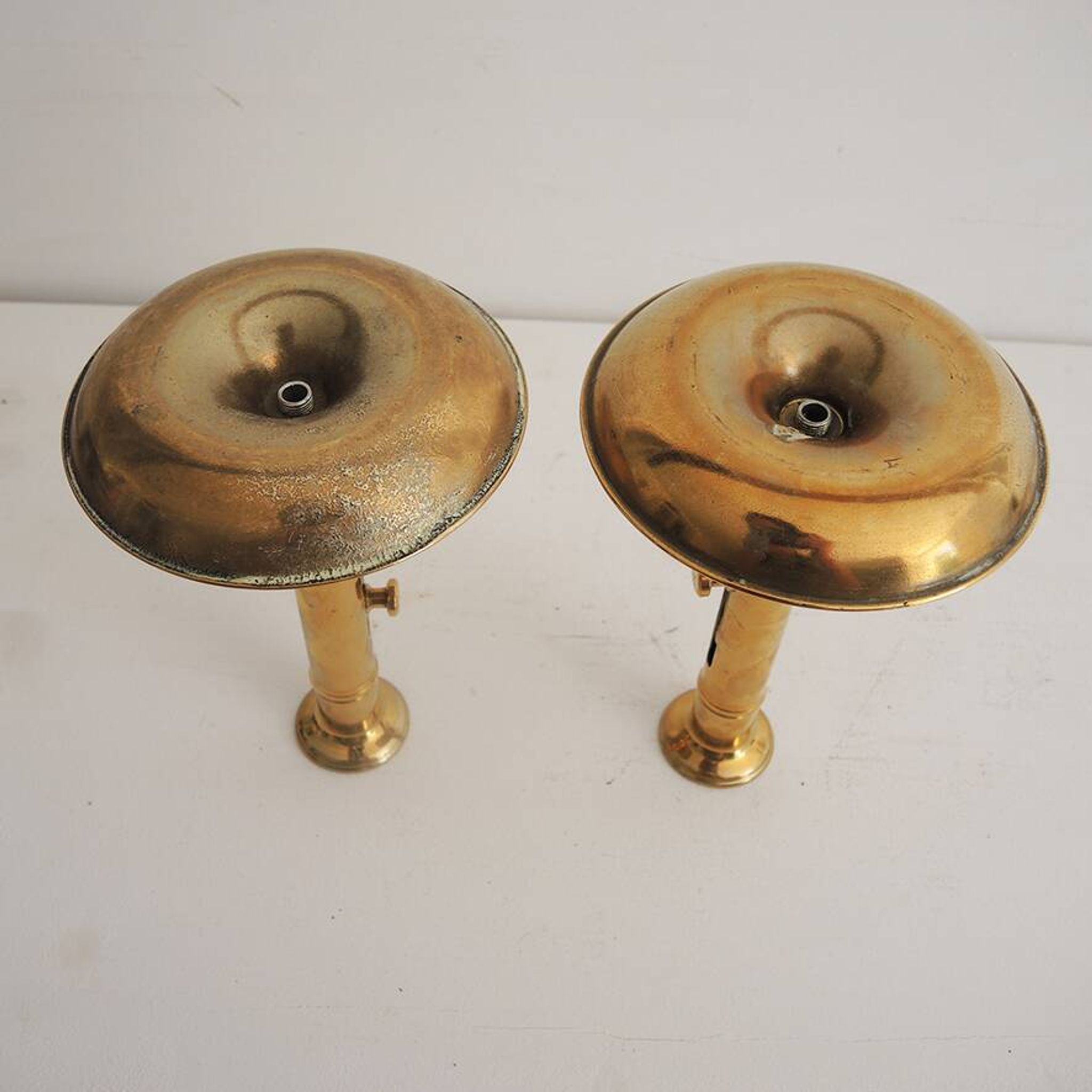 2 antique brass push candle holders