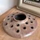 Vintage flower pot in perforated handcrafted stoneware, flattened round shape, p