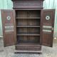 Breton cabinet with carved characters of the early 20th century with 2 doors and 1 oak drawer.