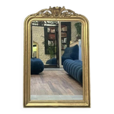 Antique Louis Philippe mirror with a pediment, beaded, from the late 19th century, featuring ear leaves.