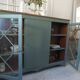 English sideboard, shallow, smoky green, wooden top.