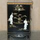 Decorative Chinese buffet in Chinoiserie style in lacquer and steatite.