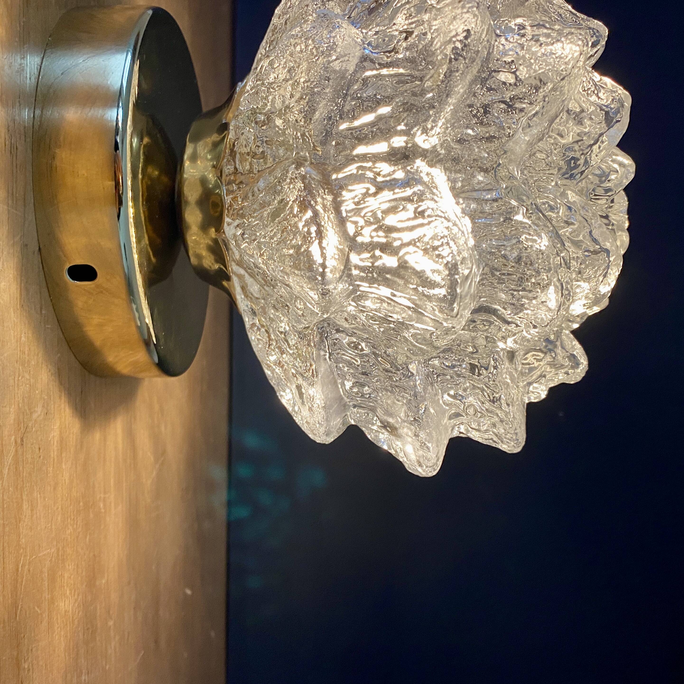 Vintage globe wall or ceiling light in molded glass in the shape of a flower