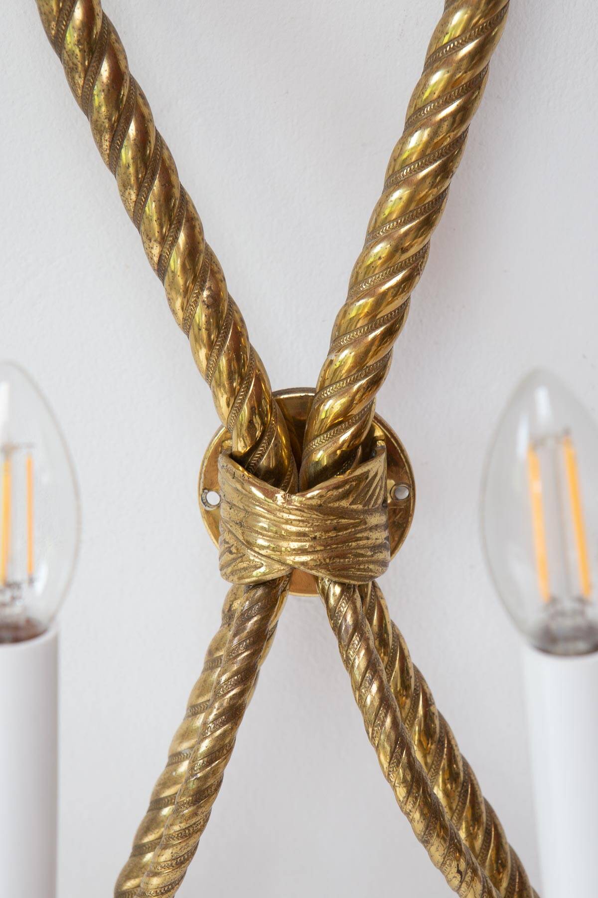 Pair of large gilded brass Noeud wall lights