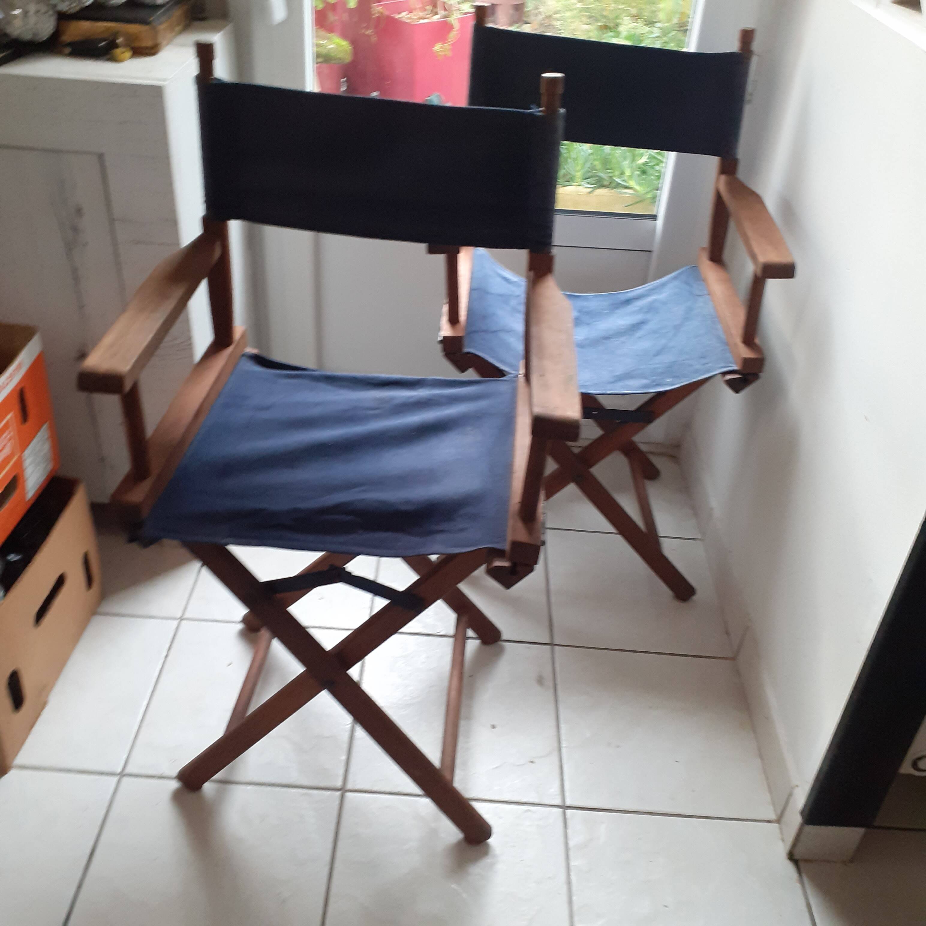 2 old director’s armchairs.