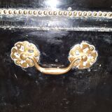 Chest in blackened wood and brass