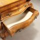 Antique drop-leaf secretary in baroque style made of walnut and maple, 20th century.