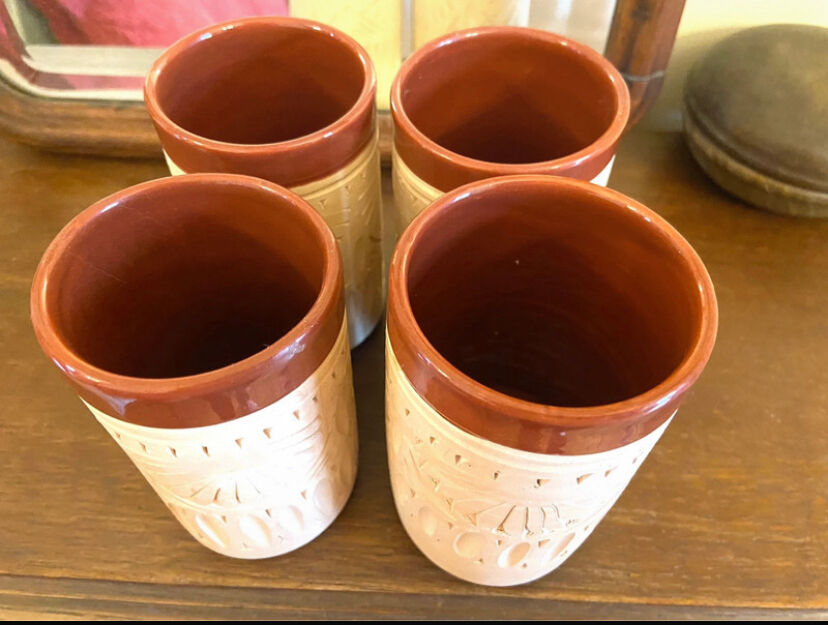 Four hand-sculpted ceramic glasses