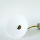 Swan neck wall light in smooth opaline and brass, early 20th century.
