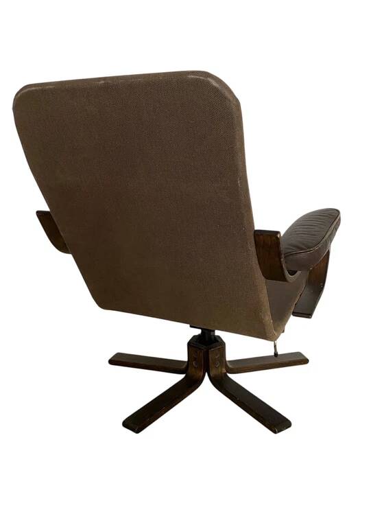 Vintage Scandinavian armchair in curved wood and leather