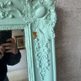 Large antique mercury mirror, patinated blue sculpted frame.