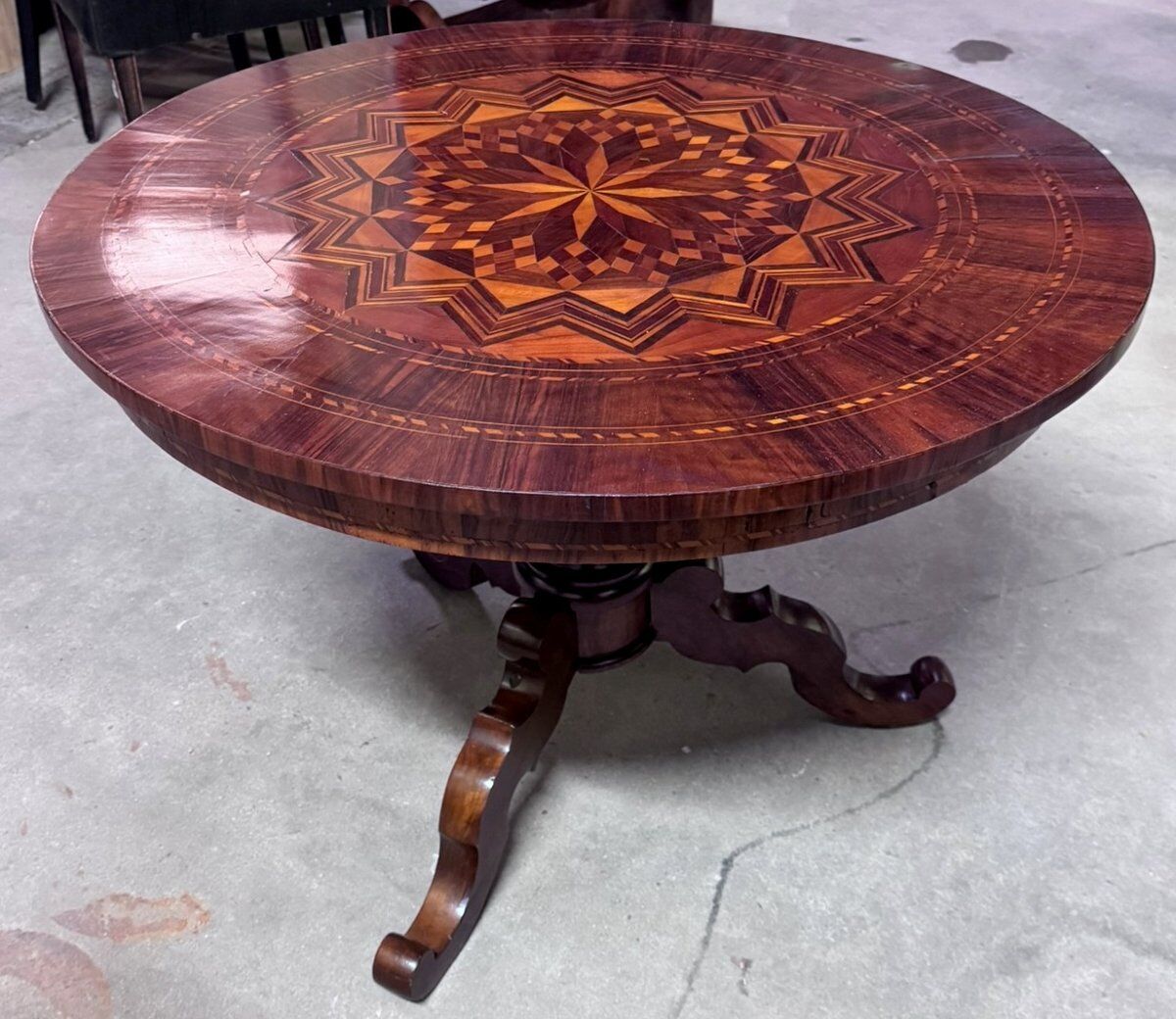 Charles X period gueridon in marquetry.