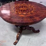 Charles X period gueridon in marquetry.