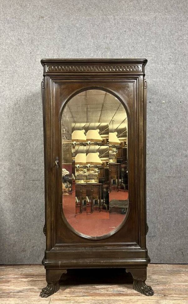 Armoire à miroir ovale style renaissance en noyer massif vers 1850