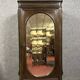 Renaissance style oval mirror cabinet in solid walnut circa 1850