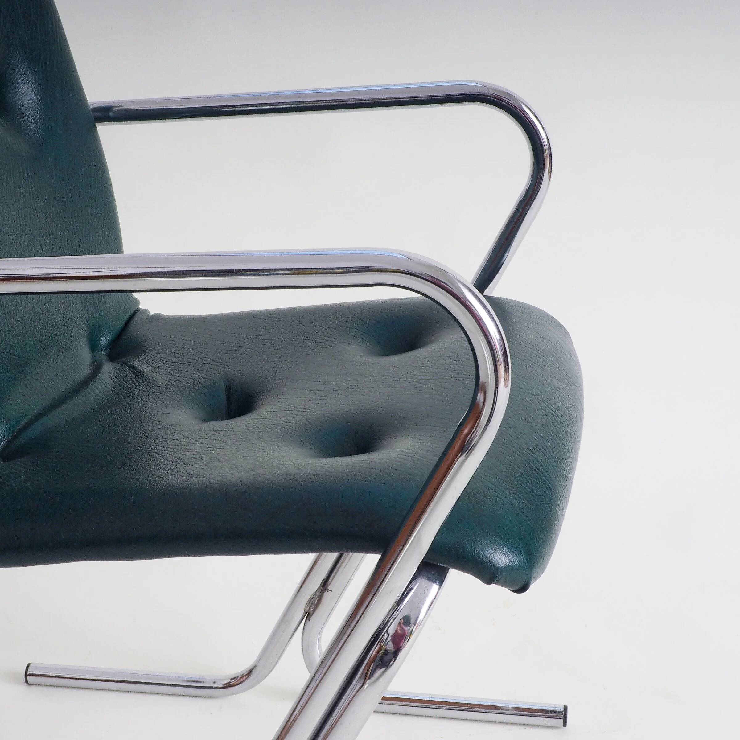 70s tubular arm chair by Tavo